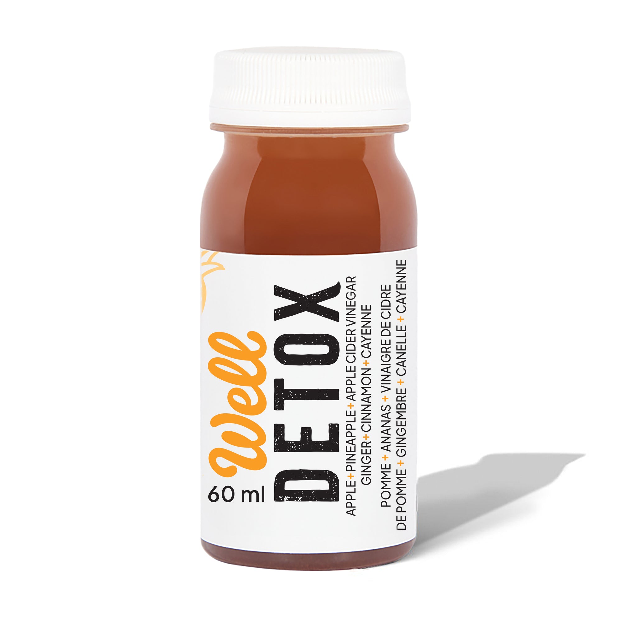 Well Juicery Detox Elixir Box front view – 24‑pack wellness shots with apple, pineapple, apple cider vinegar, ginger, cinnamon, and cayenne